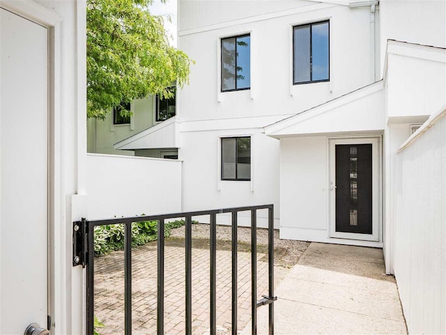 528 E Bay St Unit 30, Harbor Springs, MI 49740 - property entrance with stucco siding