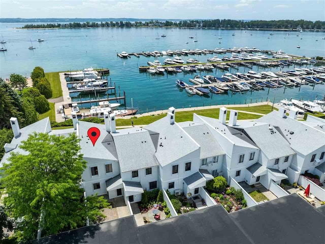 528 E Bay St Unit 30, Harbor Springs, MI 49740 - drone / aerial view of numerous boat docks and a nearby body of water