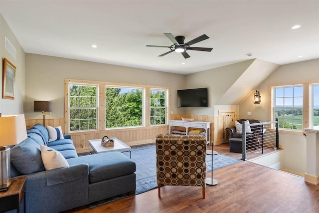 9235 Bailey Rd, East Jordan, MI 49727 - living room featuring ceiling fan, a wainscoted wall, wood finished floors, and recessed lighting