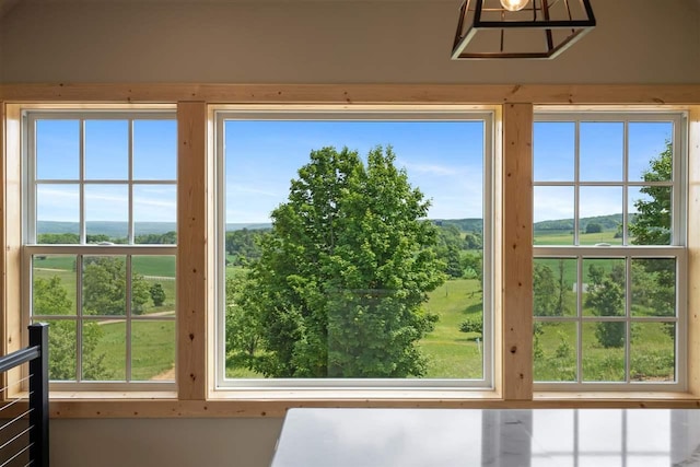 9235 Bailey Rd, East Jordan, MI 49727 - doorway to outside with healthy amount of natural light
