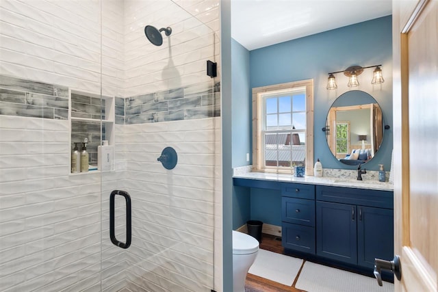 9235 Bailey Rd, East Jordan, MI 49727 - bathroom featuring a stall shower and vanity