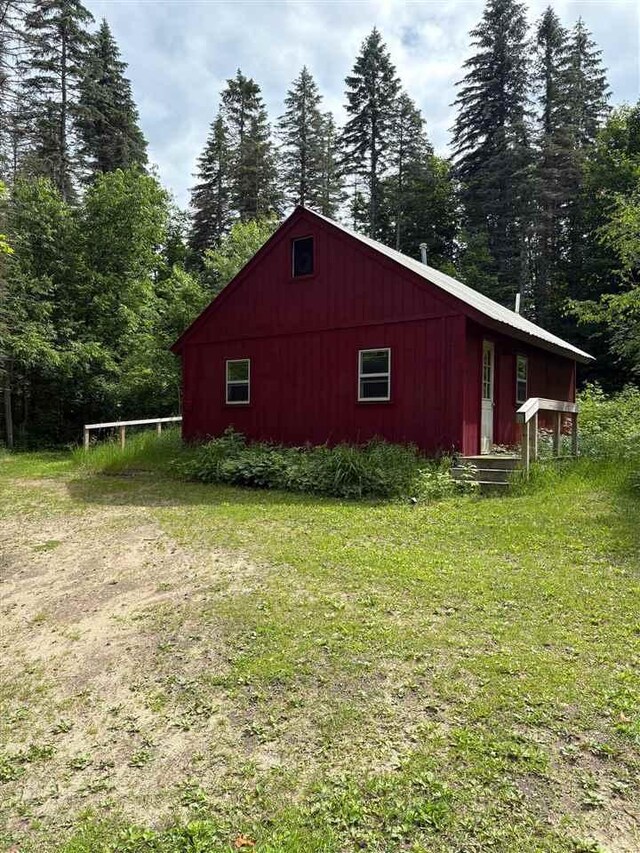 5117 Korthase Rd, Boyne City, MI 49712 - view of pole building featuring a lawn