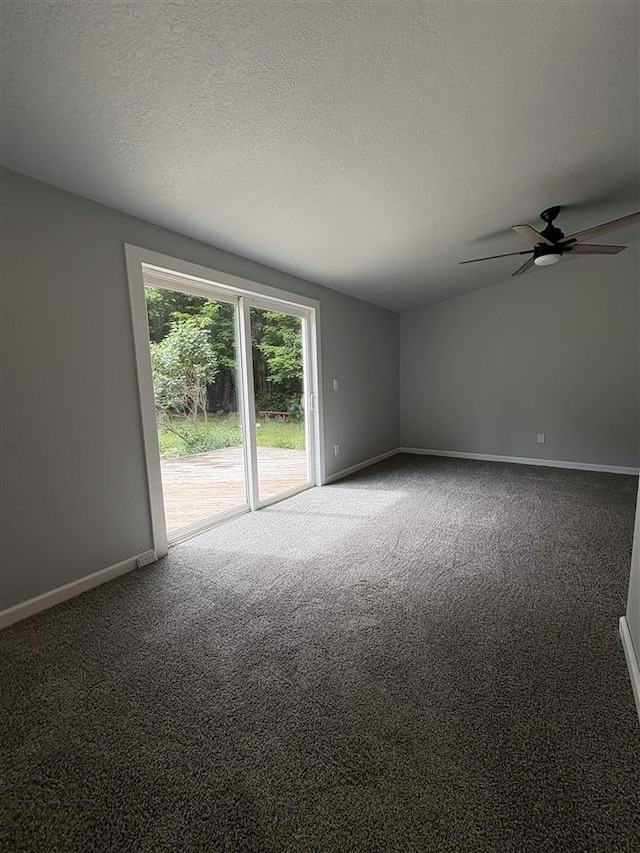 5117 Korthase Rd, Boyne City, MI 49712 - carpeted spare room with ceiling fan and a textured ceiling