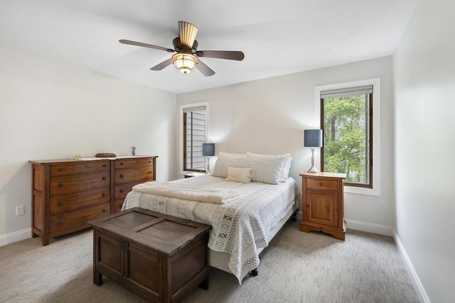 1185 Hideaway Valley Dr Unit 60, Harbor Springs, MI 49740 - bedroom featuring light colored carpet and a ceiling fan