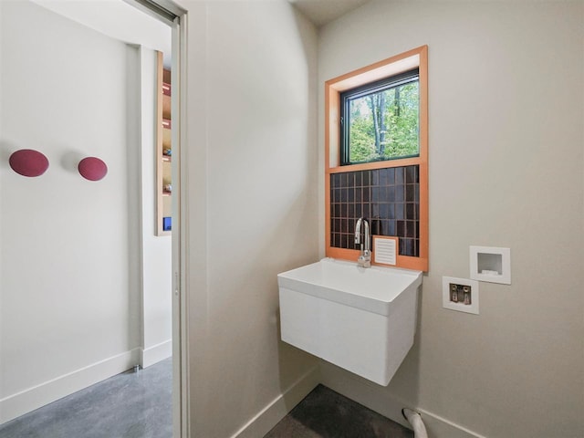 5277 Tyrol Ln, Harbor Springs, MI 49740 - bathroom with baseboards and concrete floors