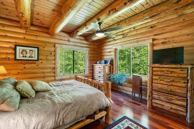 899 S State Rd, Harbor Springs, MI 49740 - bedroom with a wood ceiling with exposed beams, hardwood / wood-style flooring, and rustic walls