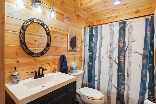 899 S State Rd, Harbor Springs, MI 49740 - full bath with vanity, wood walls, wooden ceiling, recessed lighting, and shower / bath combination with curtain