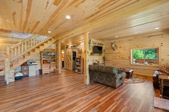 899 S State Rd, Harbor Springs, MI 49740 - living area featuring stairway, wood finished floors, wood ceiling, wood walls, and recessed lighting