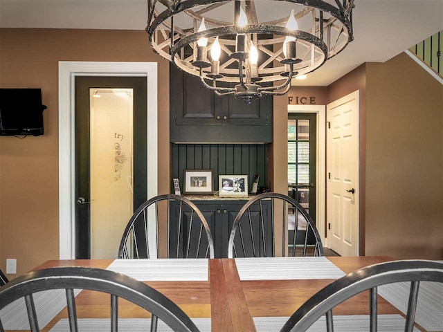 6598 Forest Way, Harbor Springs, MI 49740 - dining space with a chandelier