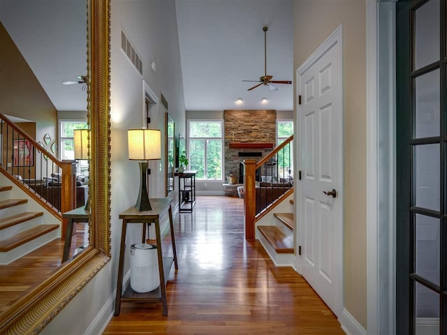 6598 Forest Way, Harbor Springs, MI 49740 - hall featuring wood finished floors and stairway