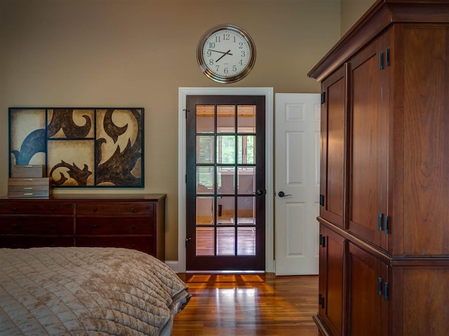 6598 Forest Way, Harbor Springs, MI 49740 - bedroom with dark wood-type flooring
