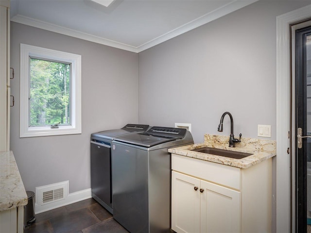 6598 Forest Way, Harbor Springs, MI 49740 - laundry room featuring separate washer and dryer, cabinet space, and ornamental molding