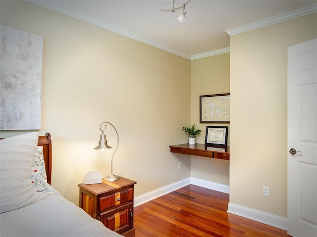 6598 Forest Way, Harbor Springs, MI 49740 - bedroom featuring wood-type flooring and crown molding