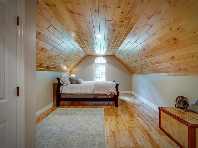 6598 Forest Way, Harbor Springs, MI 49740 - bedroom featuring wood ceiling, light wood-type flooring, and vaulted ceiling