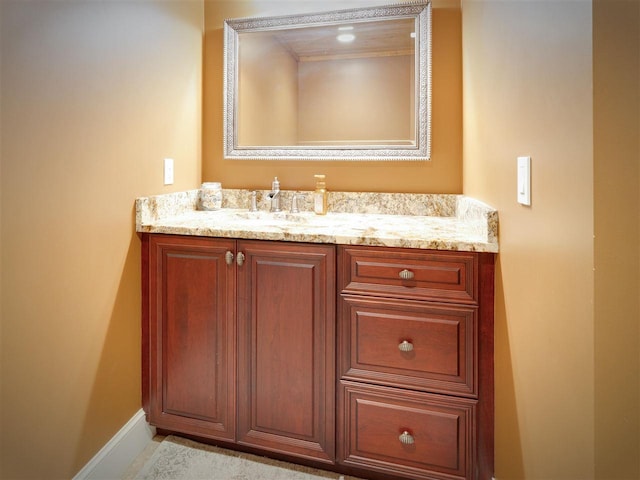 6598 Forest Way, Harbor Springs, MI 49740 - bathroom with vanity and baseboards