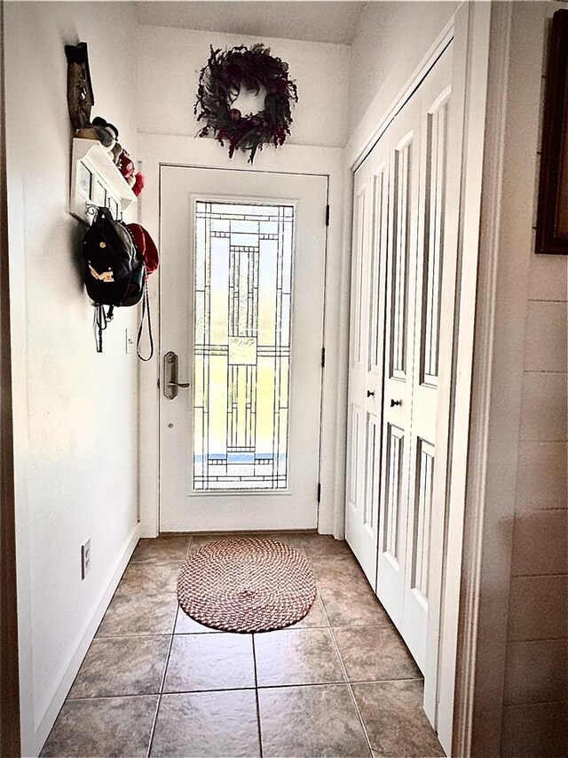 7570 Bay Meadow Dr, Harbor Springs, MI 49740 - doorway featuring tile patterned floors