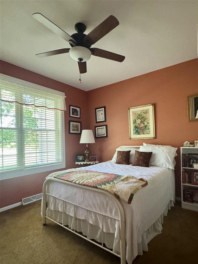 7570 Bay Meadow Dr, Harbor Springs, MI 49740 - bedroom featuring carpet and a ceiling fan