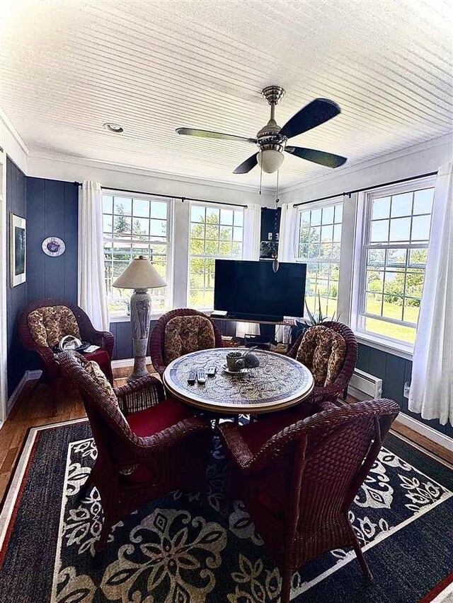 7570 Bay Meadow Dr, Harbor Springs, MI 49740 - sitting room with crown molding, wood finished floors, and ceiling fan