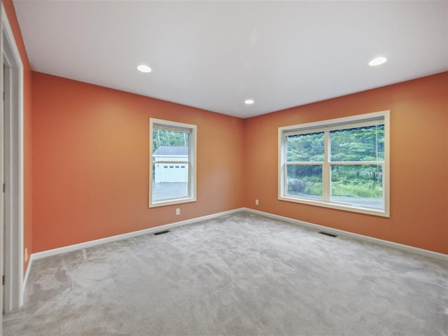 1885 Lalonde Rd, East Jordan, MI 49727 - carpeted spare room with recessed lighting and cooling unit