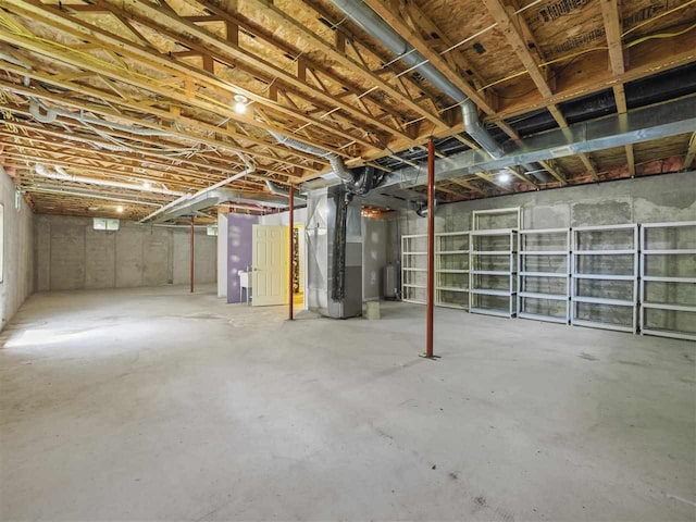 1885 Lalonde Rd, East Jordan, MI 49727 - unfinished below grade area with heating unit