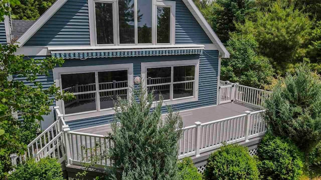 1885 Lalonde Rd, East Jordan, MI 49727 - view of side of property featuring a deck