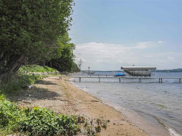 1885 Lalonde Rd, East Jordan, MI 49727 - water view featuring local beach, boat lift, and a boat dock
