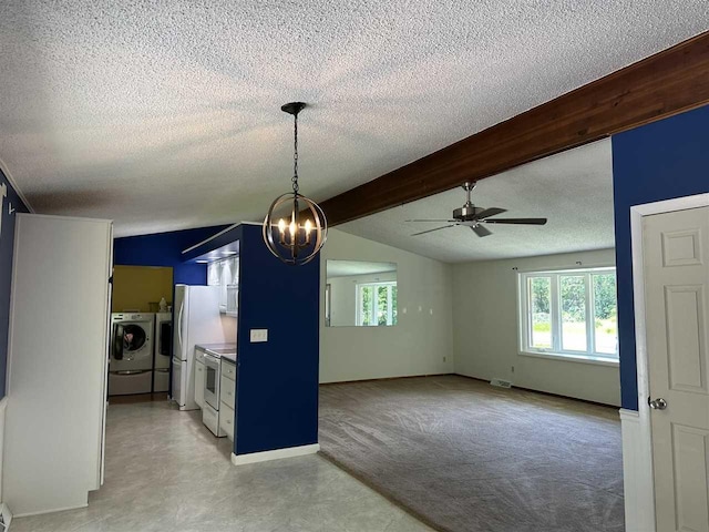4505 S State Rd, Harbor Springs, MI 49740 - kitchen with washing machine and dryer, a textured ceiling, white appliances, a ceiling fan, and a chandelier