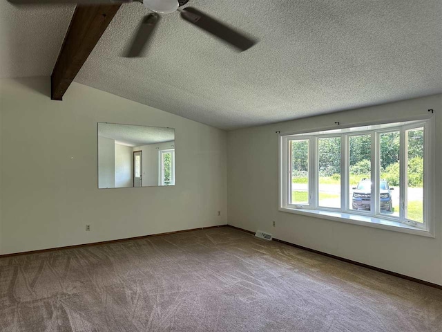 4505 S State Rd, Harbor Springs, MI 49740 - carpeted spare room with ceiling fan and a textured ceiling