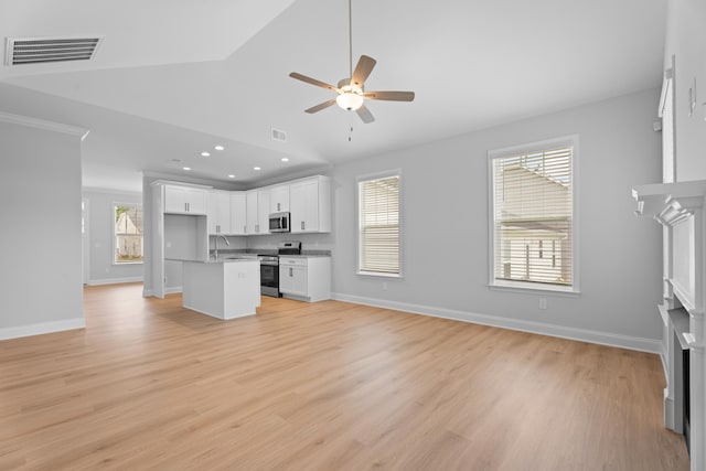 3320 Navin Trl, Roebuck, SC 29376 - unfurnished living room with ceiling fan, vaulted ceiling, recessed lighting, light wood finished floors, and a fireplace
