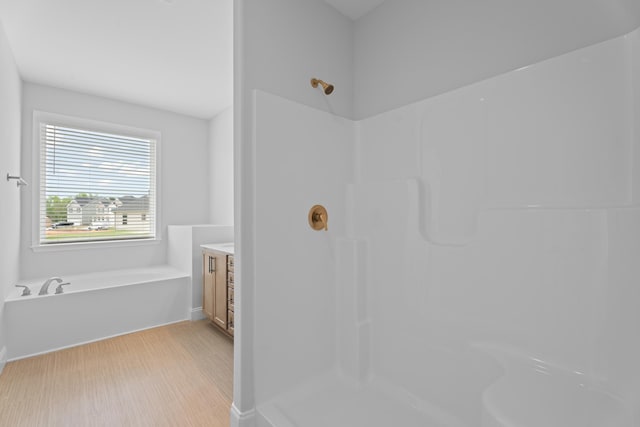 3320 Navin Trl, Roebuck, SC 29376 - bathroom with a shower, a garden tub, and vanity