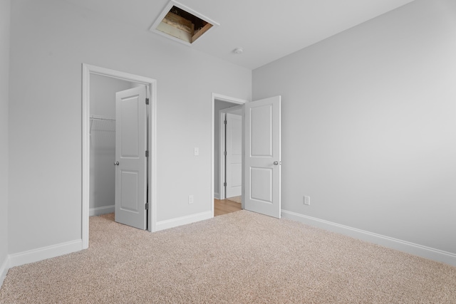 3320 Navin Trl, Roebuck, SC 29376 - unfurnished bedroom with carpet floors, a walk in closet, and a closet
