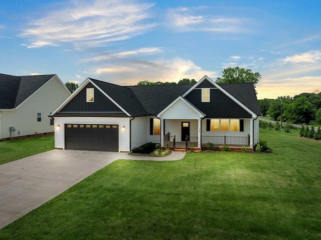 708 Mello Dr, Lyman, SC 29365 - modern inspired farmhouse featuring a porch, an attached garage, concrete driveway, and a lawn