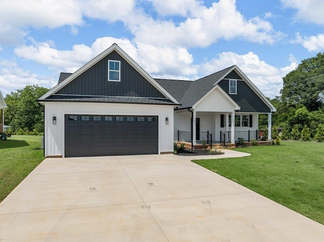 708 Mello Dr, Lyman, SC 29365 - modern farmhouse with a porch, a front lawn, concrete driveway, and a garage