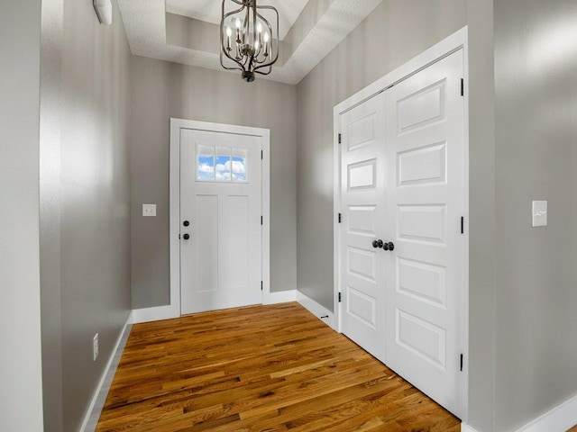 708 Mello Dr, Lyman, SC 29365 - foyer featuring a chandelier and wood finished floors