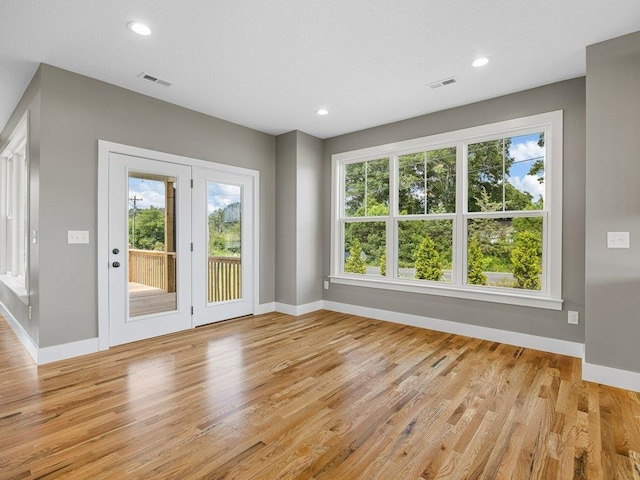 708 Mello Dr, Lyman, SC 29365 - unfurnished living room with light wood-style flooring and recessed lighting