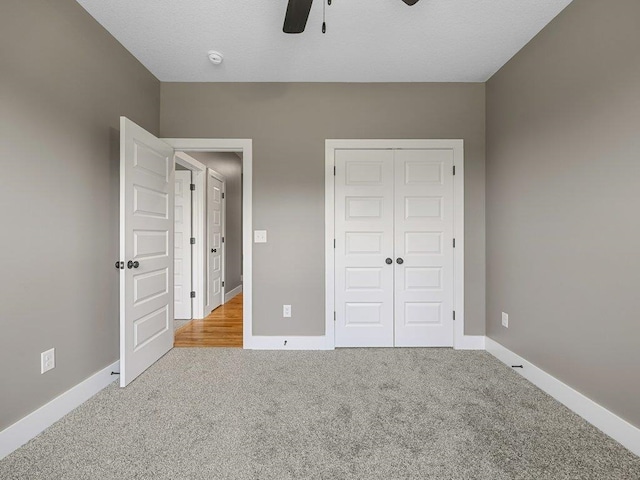 708 Mello Dr, Lyman, SC 29365 - unfurnished bedroom with carpet, a closet, and a ceiling fan
