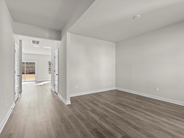 119 Martel Dr, Spartanburg, SC 29301 - spare room with dark wood-style flooring and baseboards