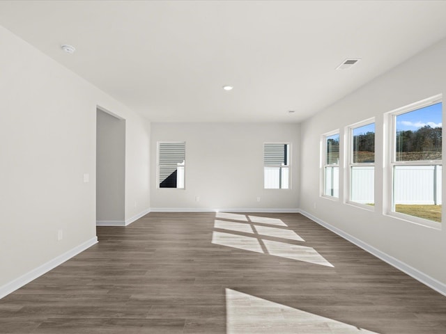 119 Martel Dr, Spartanburg, SC 29301 - empty room with plenty of natural light, a smoke detector, dark wood-style floors, and recessed lighting