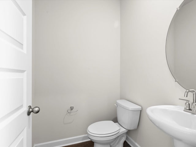 119 Martel Dr, Spartanburg, SC 29301 - bathroom featuring baseboards and a sink