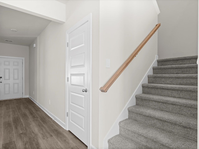 119 Martel Dr, Spartanburg, SC 29301 - stairs featuring wood finished floors and baseboards