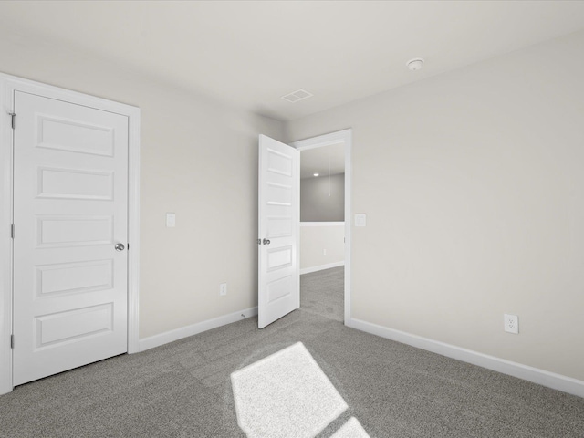 119 Martel Dr, Spartanburg, SC 29301 - unfurnished bedroom with carpet flooring and baseboards