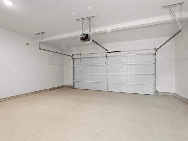 119 Martel Dr, Spartanburg, SC 29301 - garage featuring a garage door opener and baseboards