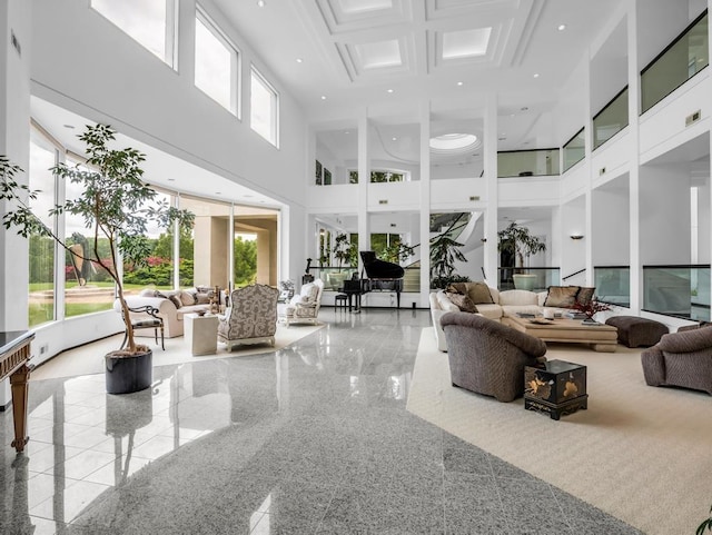 110 W King Ridge St, Gaffney, SC 29341 - living room featuring a towering ceiling, granite floors, and plenty of natural light