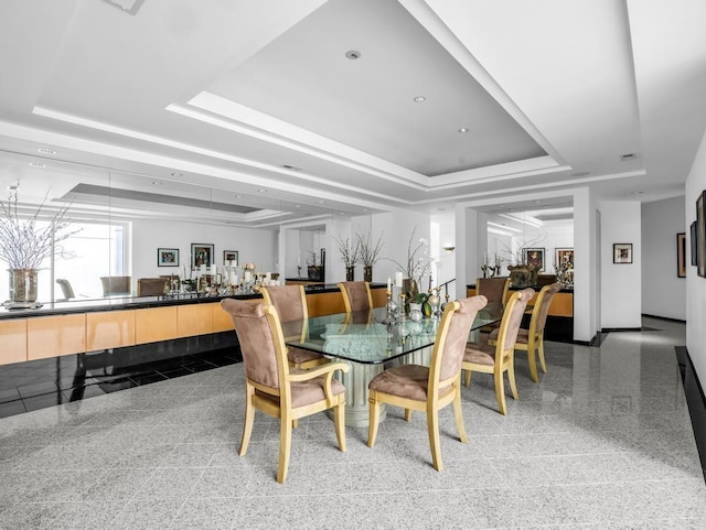 110 W King Ridge St, Gaffney, SC 29341 - dining space featuring a raised ceiling, granite tiled floors, and bar area