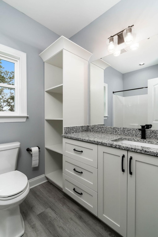 331 Skyline Rd, Greer, SC 29651 - bathroom with wood finished floors, vanity, and a shower