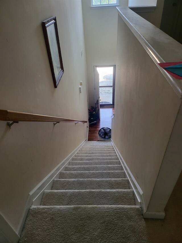359 Edgemont Ave, Spartanburg, SC 29301 - stairway with healthy amount of natural light and carpet