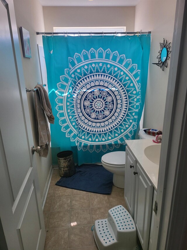 359 Edgemont Ave, Spartanburg, SC 29301 - bathroom with tile patterned floors, vanity, and curtained shower
