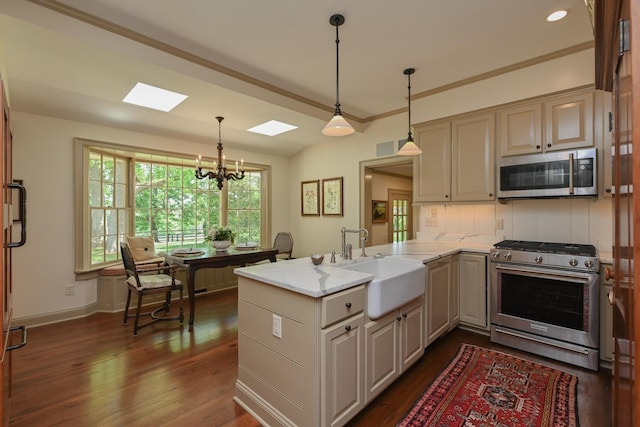 835 Jackson Grove Rd, Columbus, NC 28722 - kitchen featuring appliances with stainless steel finishes, a skylight, a peninsula, a chandelier, and dark wood-type flooring