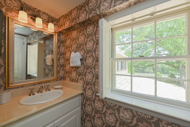 835 Jackson Grove Rd, Columbus, NC 28722 - bathroom with wallpapered walls, vanity, and plenty of natural light