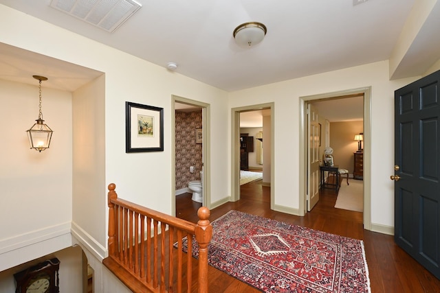 835 Jackson Grove Rd, Columbus, NC 28722 - corridor featuring an upstairs landing and dark wood-type flooring